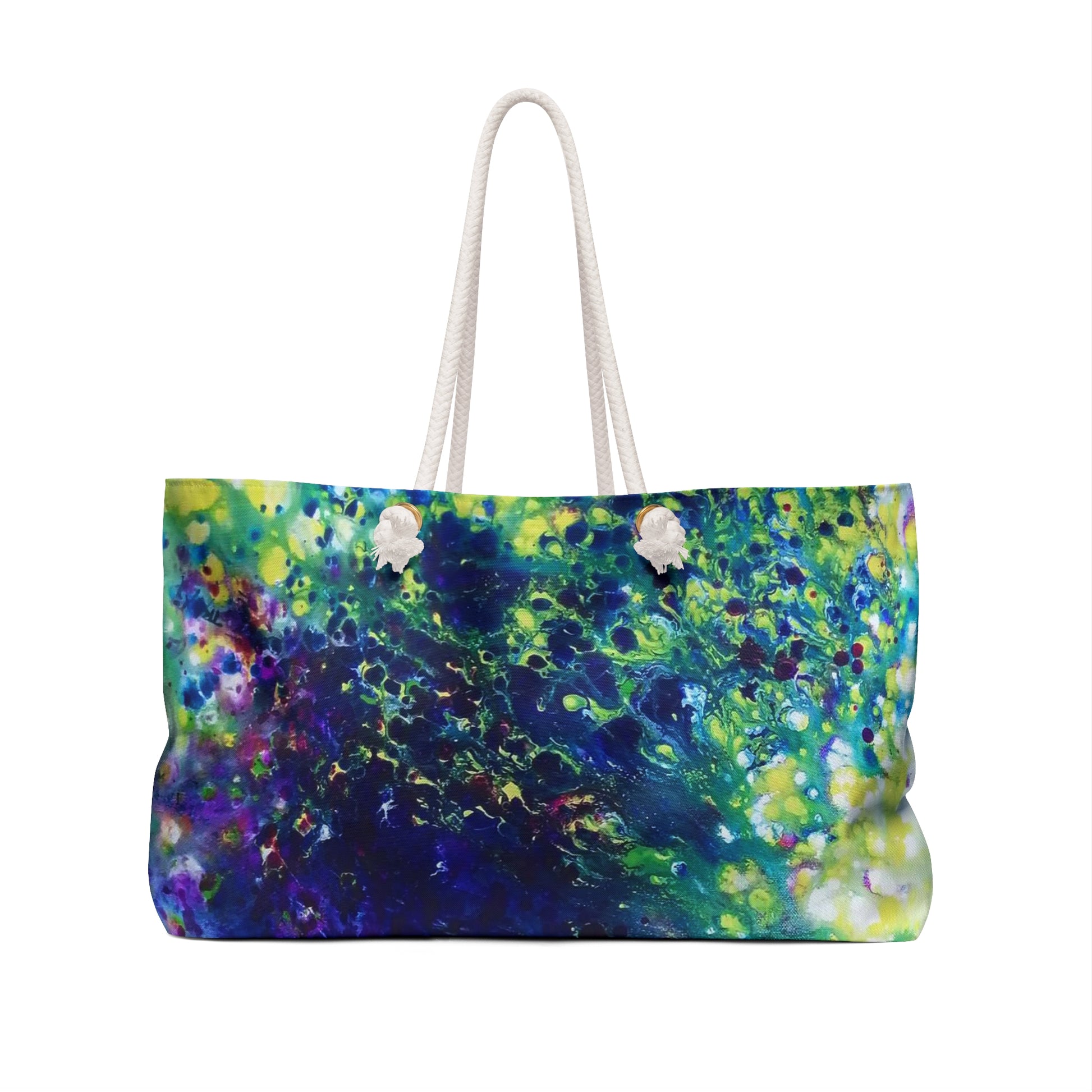 Aromatic lavender symphony beach bag featuring vibrant wearable art inspired by the painting Aromatic Lavender Symphony by Diana Dimova TRAXI. A tote bag with a vibrant abstract art print featuring swirling patterns of blue, green, yellow, and purple, complete with two white rope handles, shown against a plain white background.