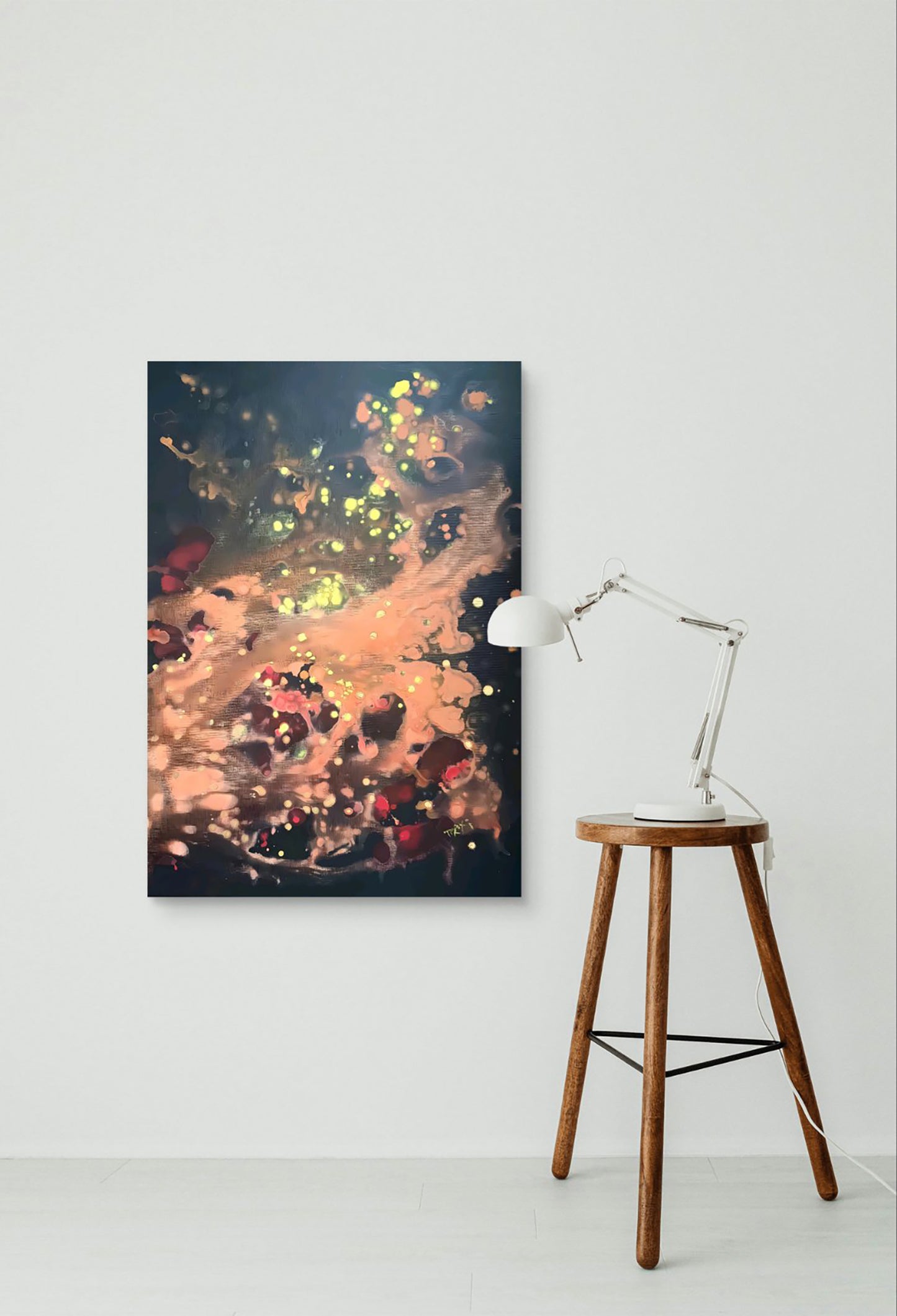 Original Painting, Spiritual Abstract, TRAXI, Fluid Acrylic Pouring, Contemporary Art, Wall Decor, Mystical Painting, Whispers of the Wood Snake, Award Winning Art An abstract canvas wall art print featuring glowing orange, yellow, and red light spots on a dark navy background, styled in a minimalist room setting next to a wooden stool and a white desk lamp.