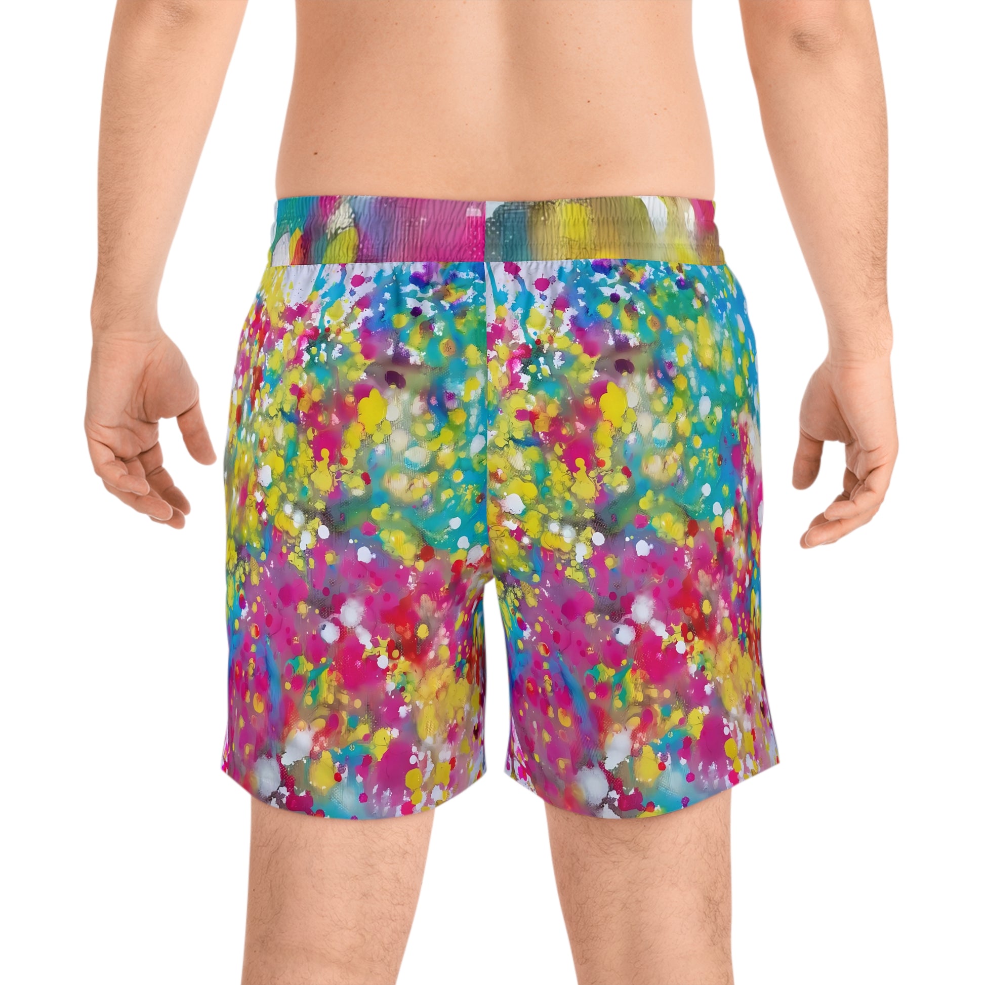 Men's summer beach swim shorts of happiness featuring abstract wearable art inspired by the Paintings of Happiness series by Diana Dimova TRAXI. A man wearing colorful paint-splatter swim trunks, shown from the back against a plain white background.