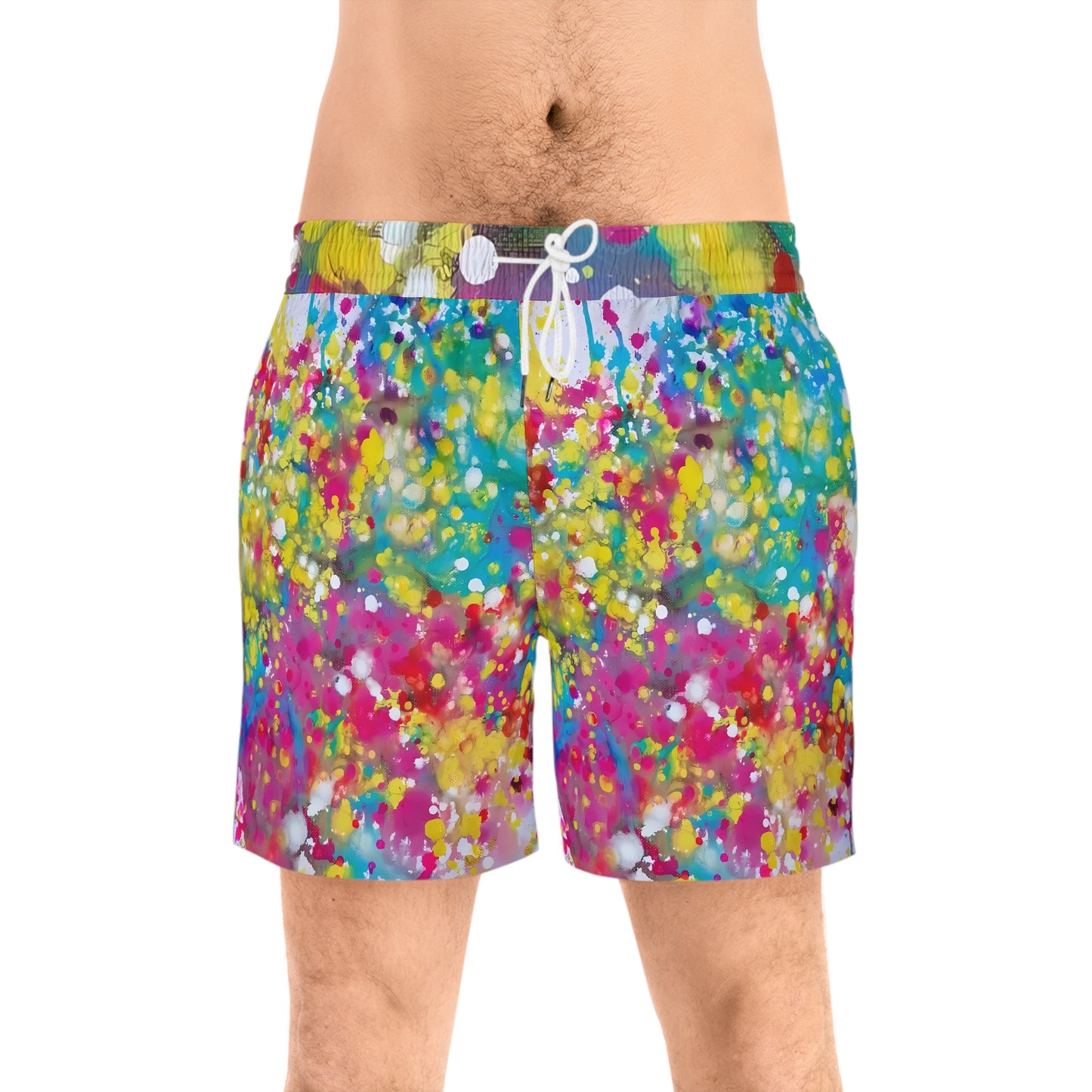 Men's summer beach swim shorts of happiness featuring abstract wearable art inspired by the Paintings of Happiness series by Diana Dimova TRAXI. Men's swim trunks with a vibrant multicolor paint splatter pattern, featuring a multicolor watercolor-style waistband and a white drawstring, modeled on a person against a white background.