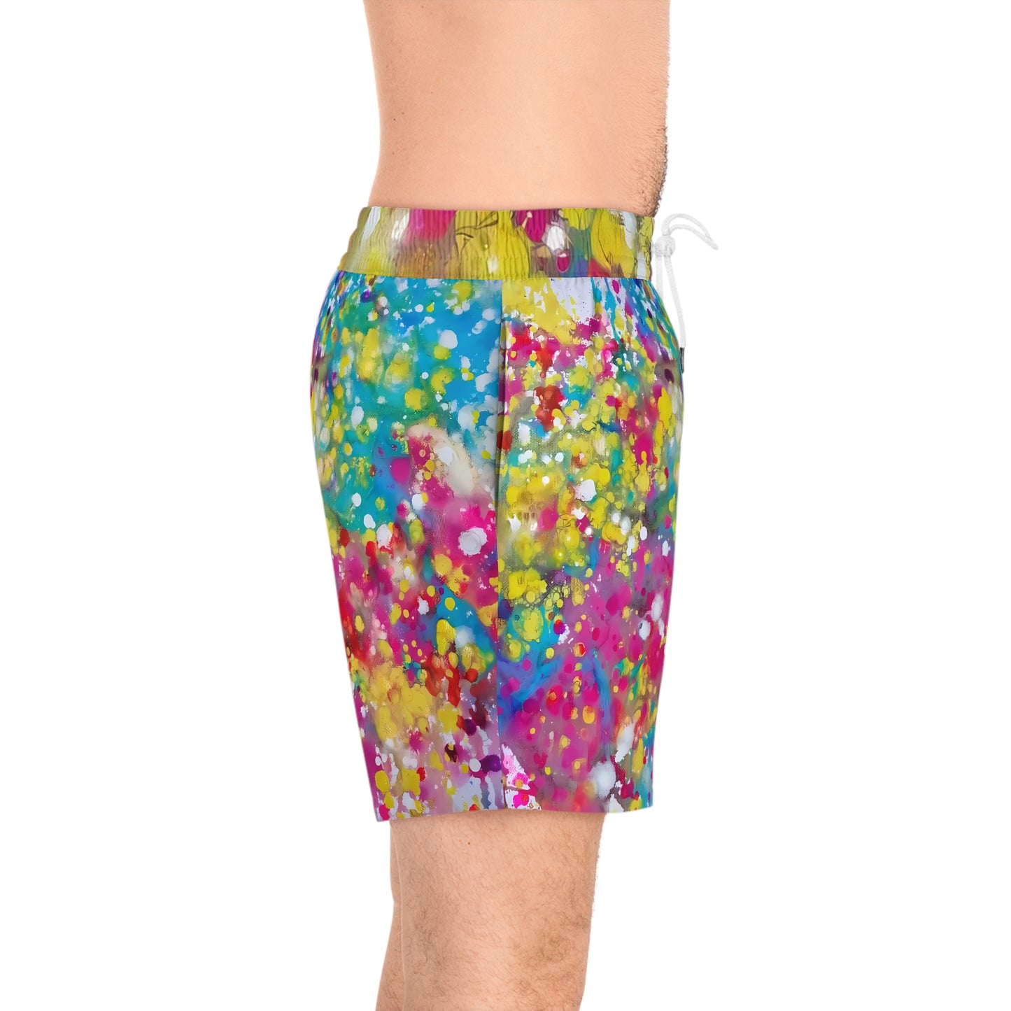 Men's summer beach swim shorts of happiness featuring abstract wearable art inspired by the Paintings of Happiness series by Diana Dimova TRAXI. A person wearing colorful paint-splatter print swim trunks, shown from the waist down against a plain white background.