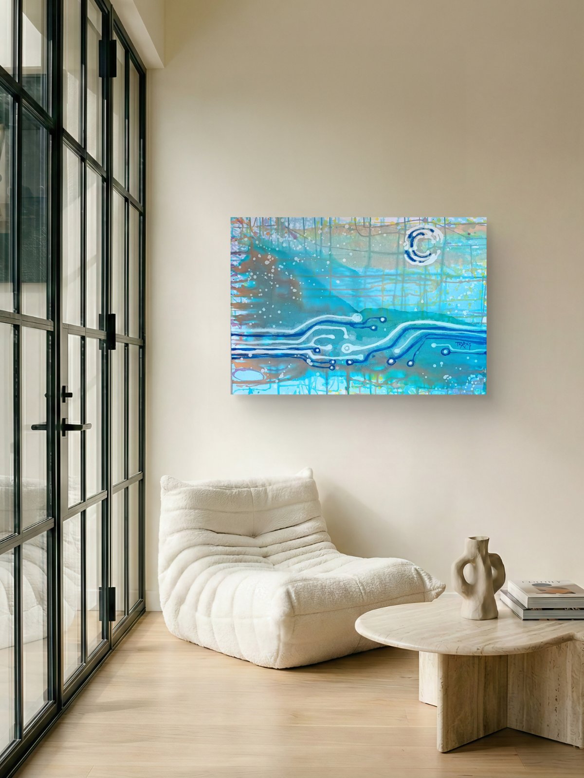 Seascape & Technology "Ocean Dialogue," an original contemporary abstract Blue  Ocean painting by Diana Dimova – TRAXI.  An abstract canvas painting with blue, teal, and white wavy patterns hanging on a beige wall in a modern living room setting with a white lounge chair and a small wooden table.