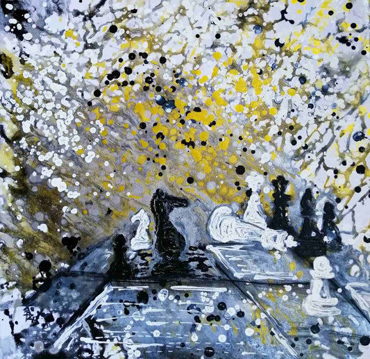 Original symbolic abstract painting Black Wins Again by Diana Dimova TRAXI, featuring chess elements in white, black, and gold tones. Abstract painting featuring black and white chess pieces on a board, surrounded by splattered yellow, white, and black paint on a gray background.