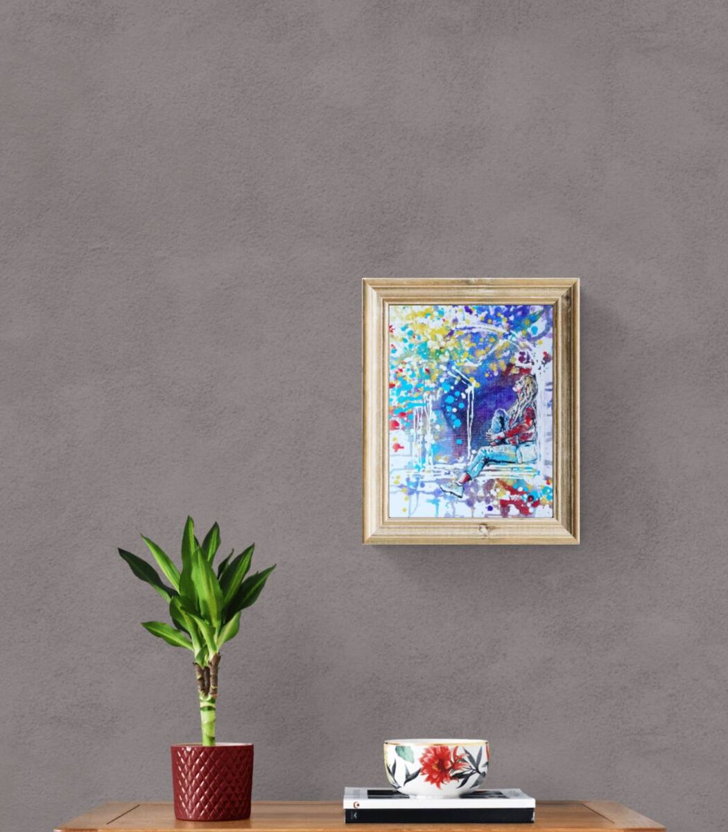 Original framed painting Talking with the Stars by Diana Dimova TRAXI, featuring a spiritual window composition with a girl reaching toward a starry night sky. A framed colorful painting hangs on a textured gray wall above a wooden console table with a potted green plant and a small floral bowl.