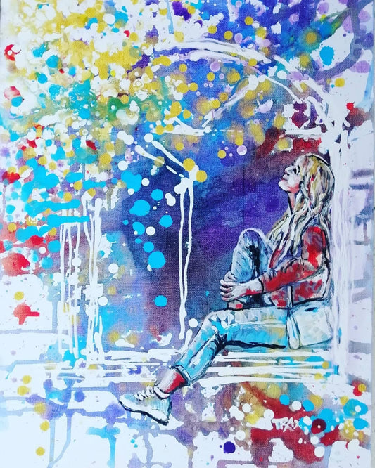 Original framed painting Talking with the Stars by Diana Dimova TRAXI, featuring a spiritual window composition with a girl reaching toward a starry night sky. Watercolor painting of a young woman sitting on a bench under a colorful tree, rendered in expressive splashes of blue, purple, red, yellow, and white.