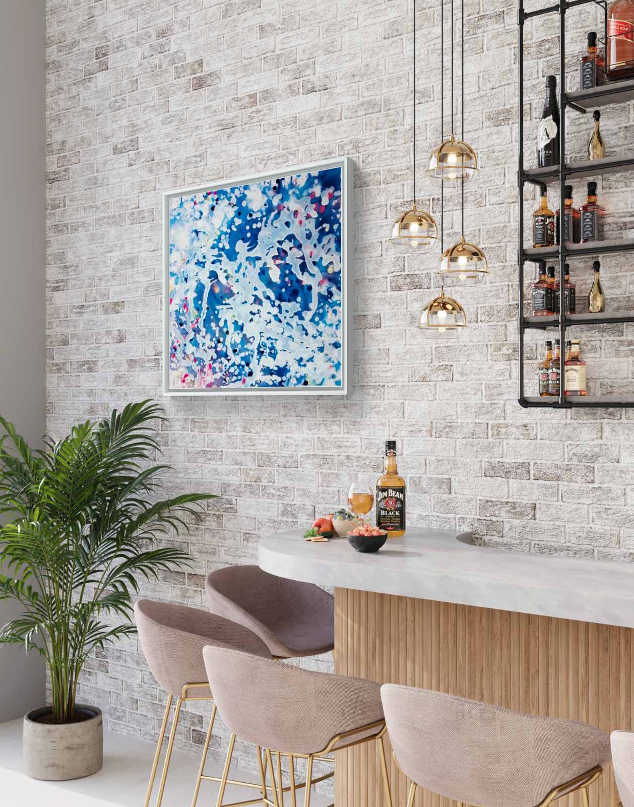 Original spiritual abstract painting Prayer by Diana Dimova TRAXI, featuring a white angel and protective wings in white and blue tones. A modern interior scene with a white brick wall, a colorful abstract painting, a bar counter, blush pink bar stools, hanging gold pendant lights, and a potted plant.