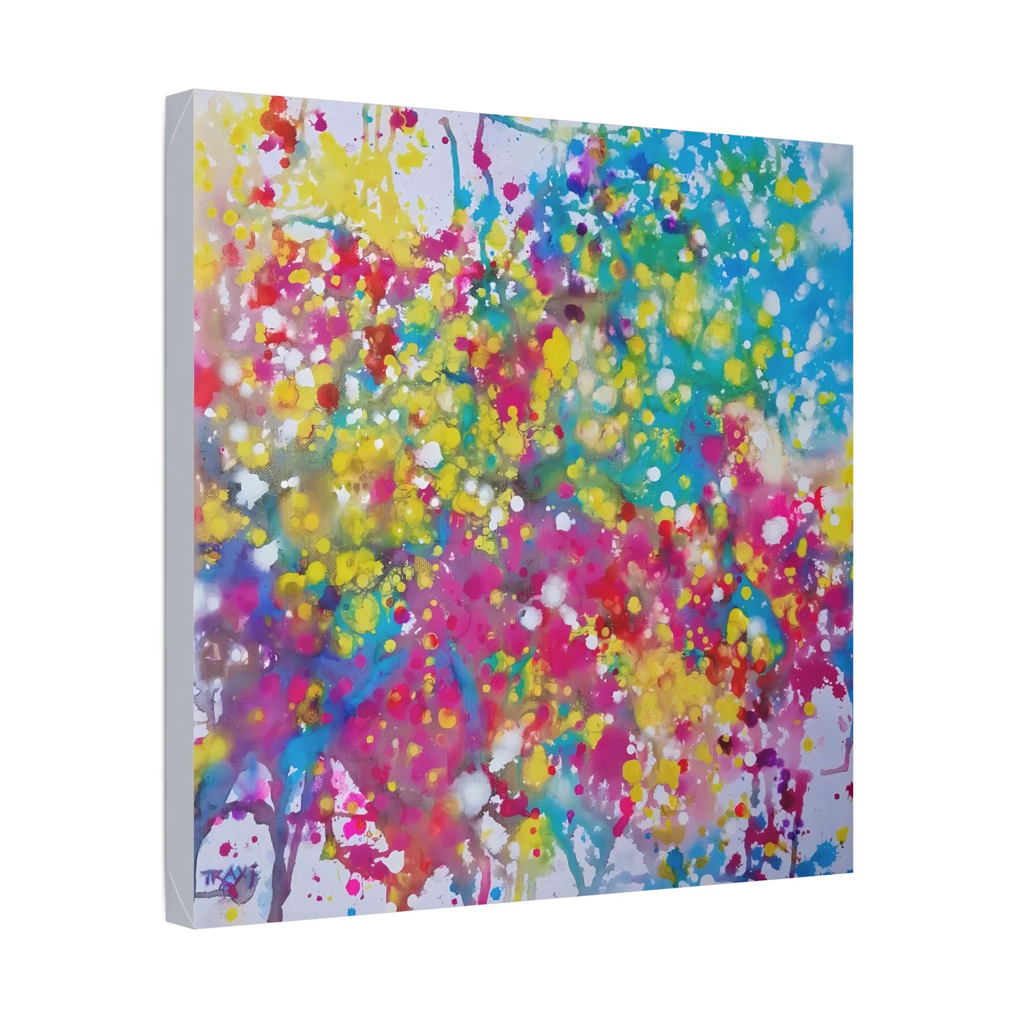 Painting of happiness 2 vibrant abstract canvas print by award-winning contemporary artist Diana Dimova - TRAXI, featuring radiant pink, yellow, and blue colors. Square abstract canvas wall art featuring a vibrant splatter and drip pattern in pink, yellow, blue, red, and white, shown at a three-quarter angle on a white background.