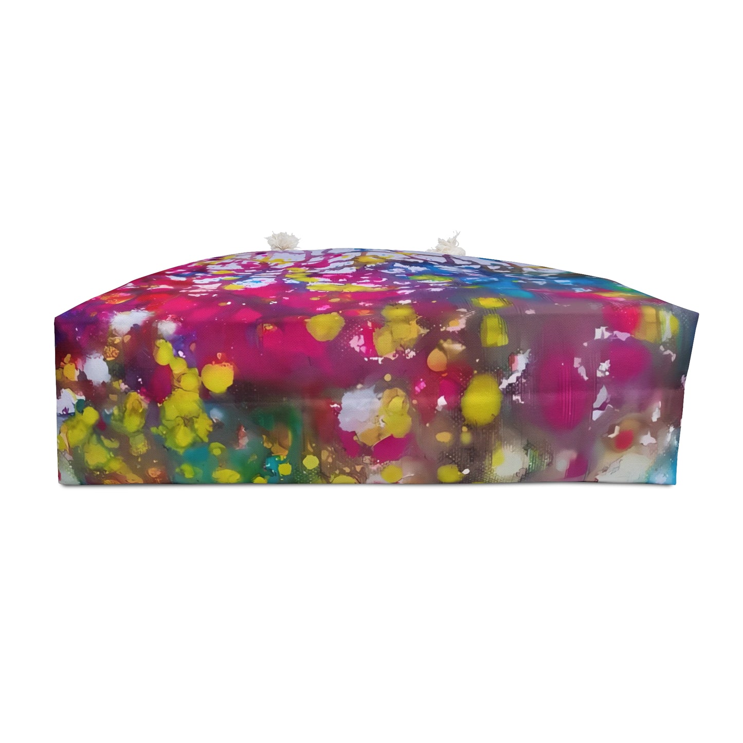 Paintings of happiness beach bag featuring vibrant wearable art inspired by the Paintings of Happiness series by Diana Dimova TRAXI. A rectangular floor cushion with a vibrant, multicolored abstract paint splatter pattern, shown against a plain white background.
