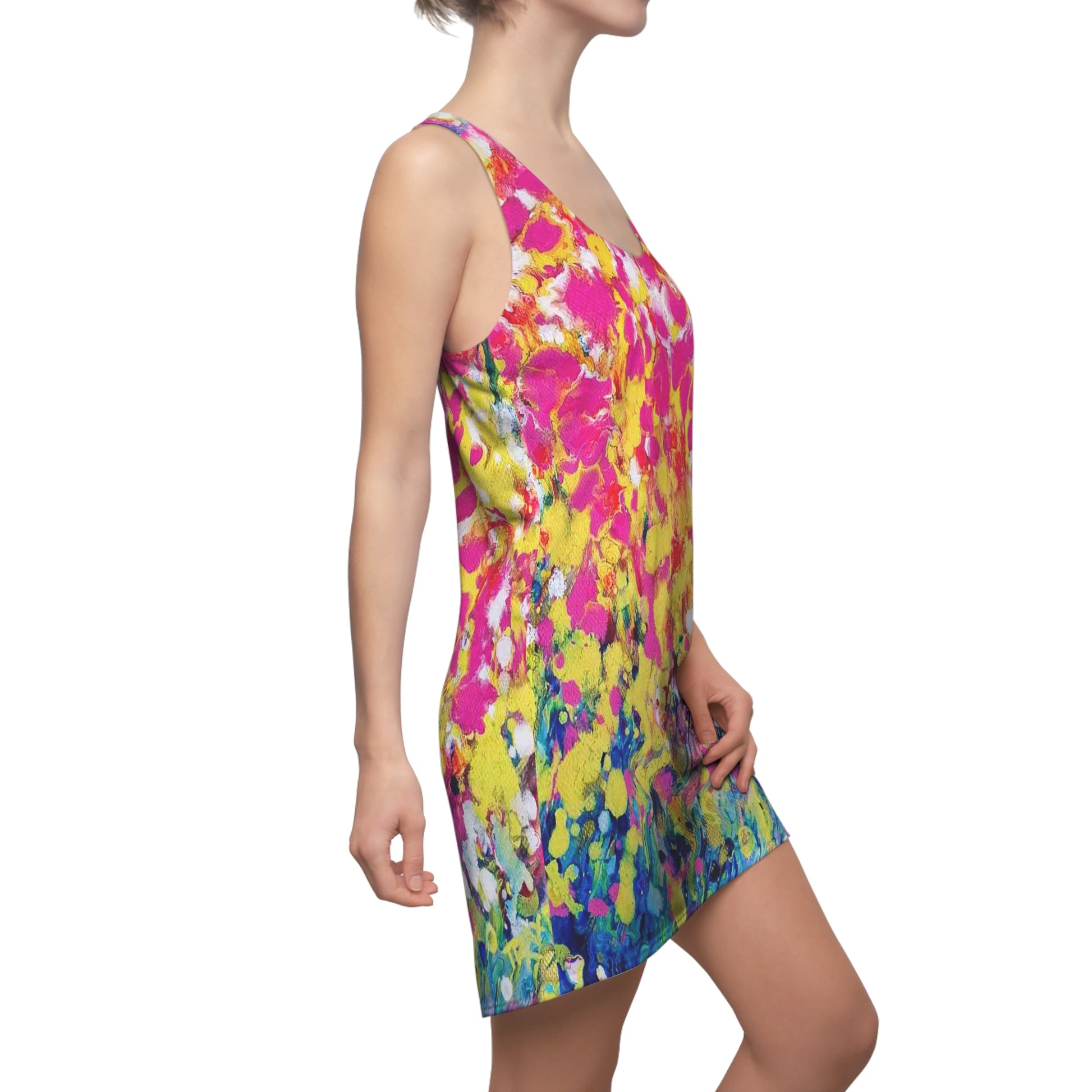 Women's racerback summer dress of happiness featuring abstract wearable art inspired by the painting Summer Flowers by Diana Dimova TRAXI. A woman modeling a sleeveless V-neck mini dress with a vibrant abstract watercolor print in pink, yellow, blue, and white, shown from a side profile against a plain white background.