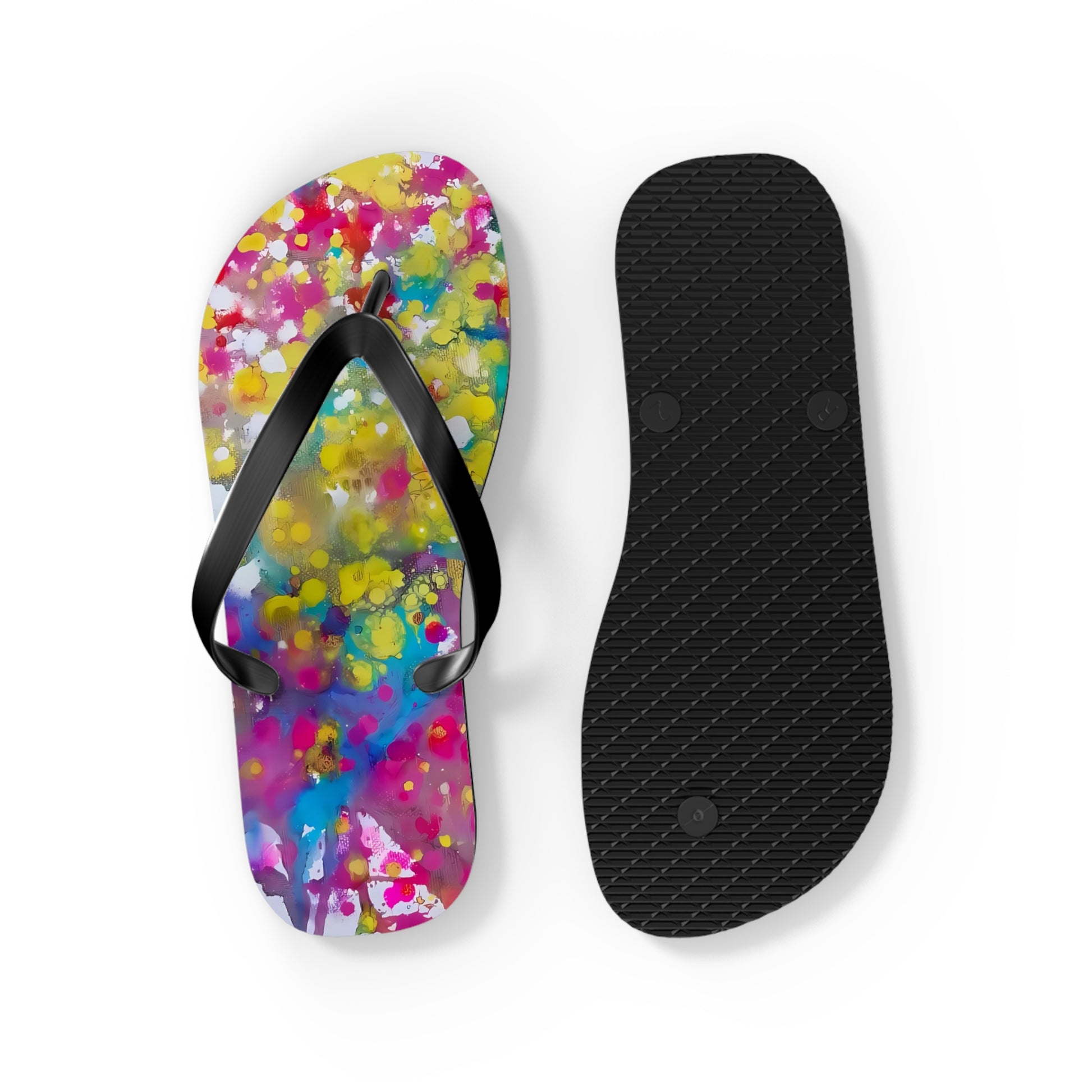 Summer beach flip flops of happiness featuring abstract wearable art inspired by the Paintings of Happiness series by Diana Dimova TRAXI. A pair of flip-flops shown on a white background, with one sandal upright to display the colorful abstract print and the other lying flat to show the black textured sole.