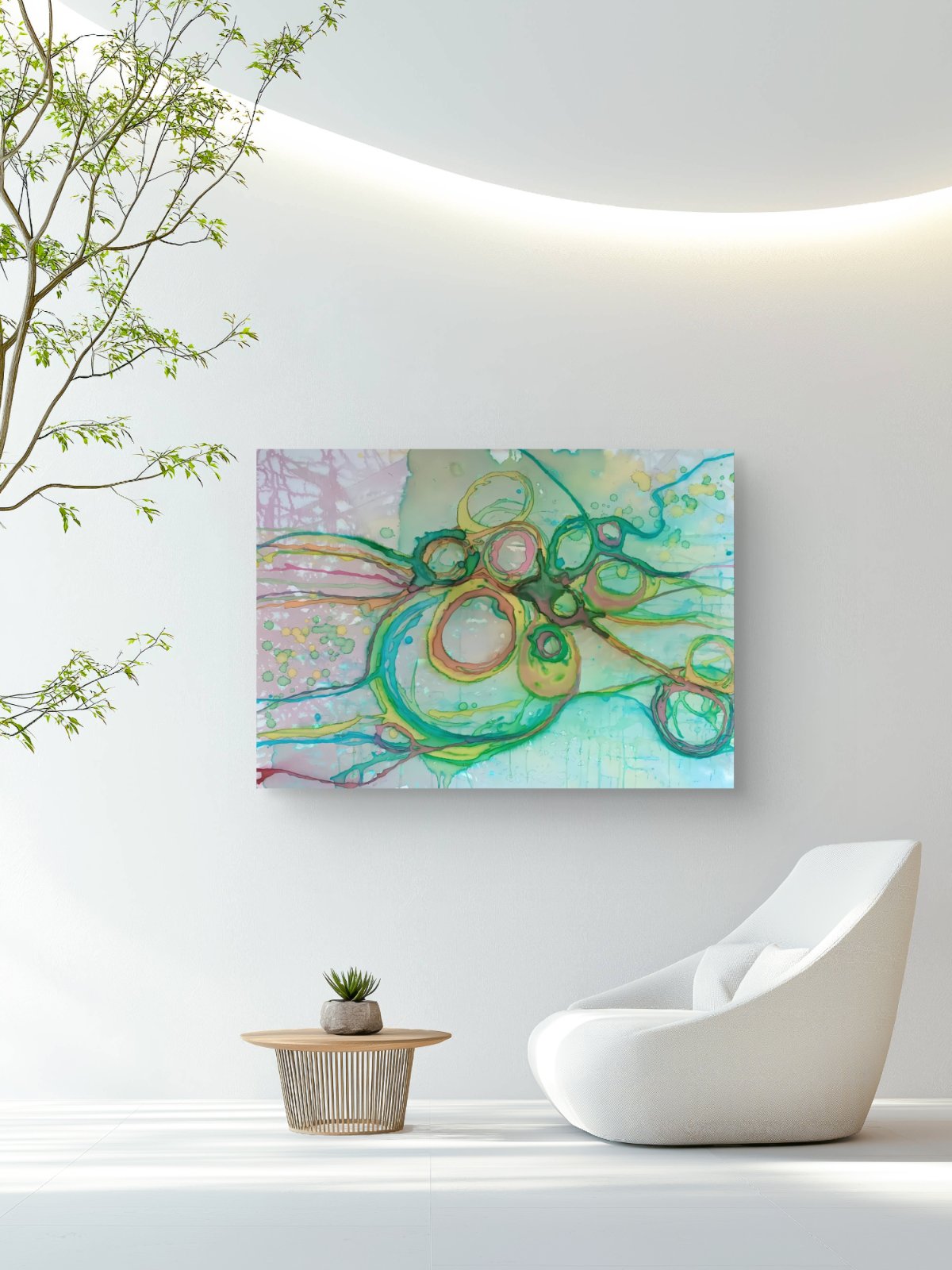 Original abstract painting titled 'The Balance' by TRAXI featuring serene textures and organic rhythms. The artwork represents the culmination of the series States of Becoming, exploring harmony, nature, and spiritual equilibrium. Abstract wall art print featuring flowing green, teal, yellow, and pink brushstrokes, displayed on a white wall in a modern living room setting with a white chair and side table.
