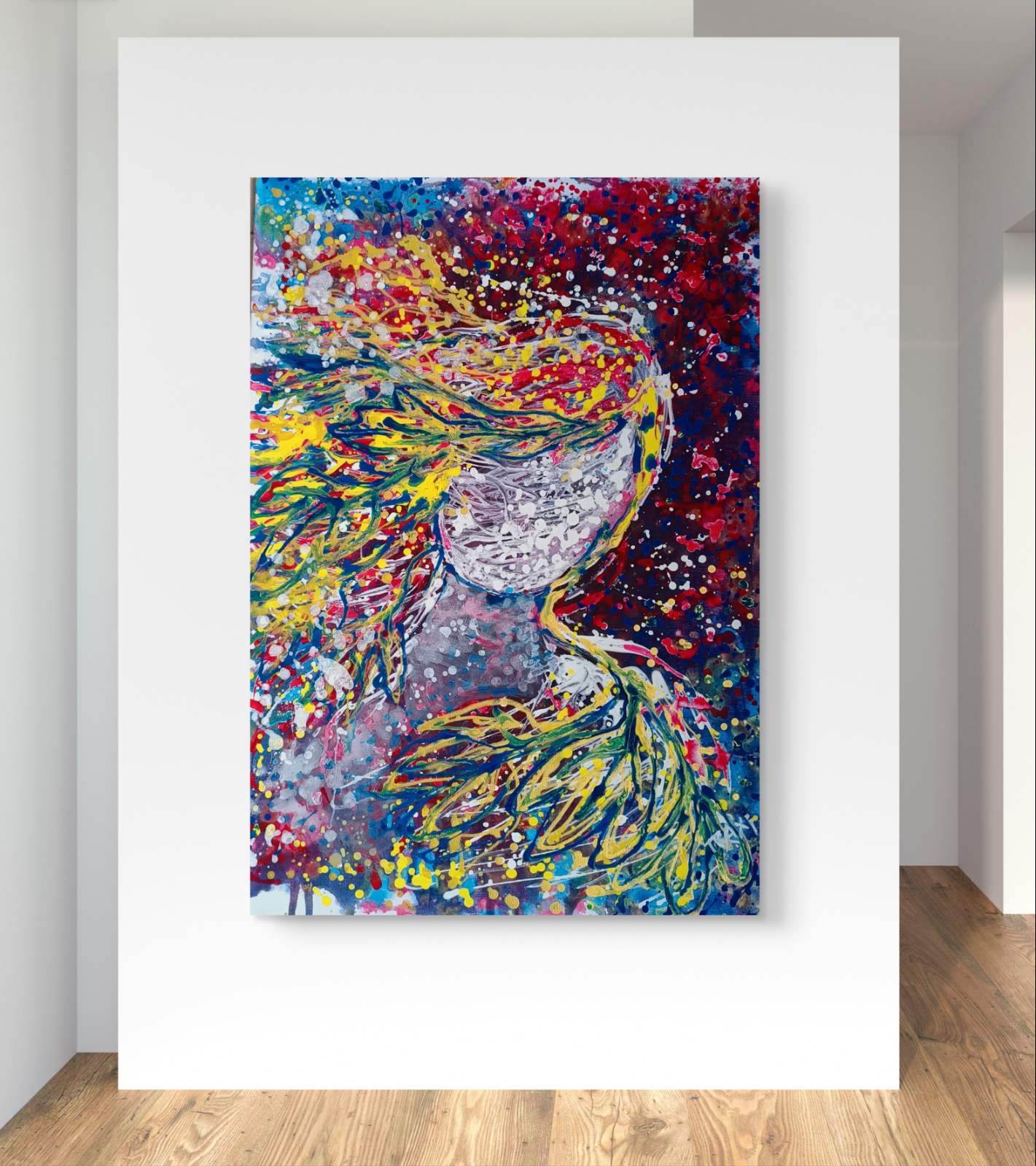 A colorful abstract canvas painting featuring a stylized face with flowing yellow, green, and blue hair, displayed on a white wall above a light wood floor. Autumn’s Smile original abstract portrait fluid acrylic painting with warm burgundy, gold, and orange tones representing feminine autumn energy by Diana Dimova TRAXI ART.