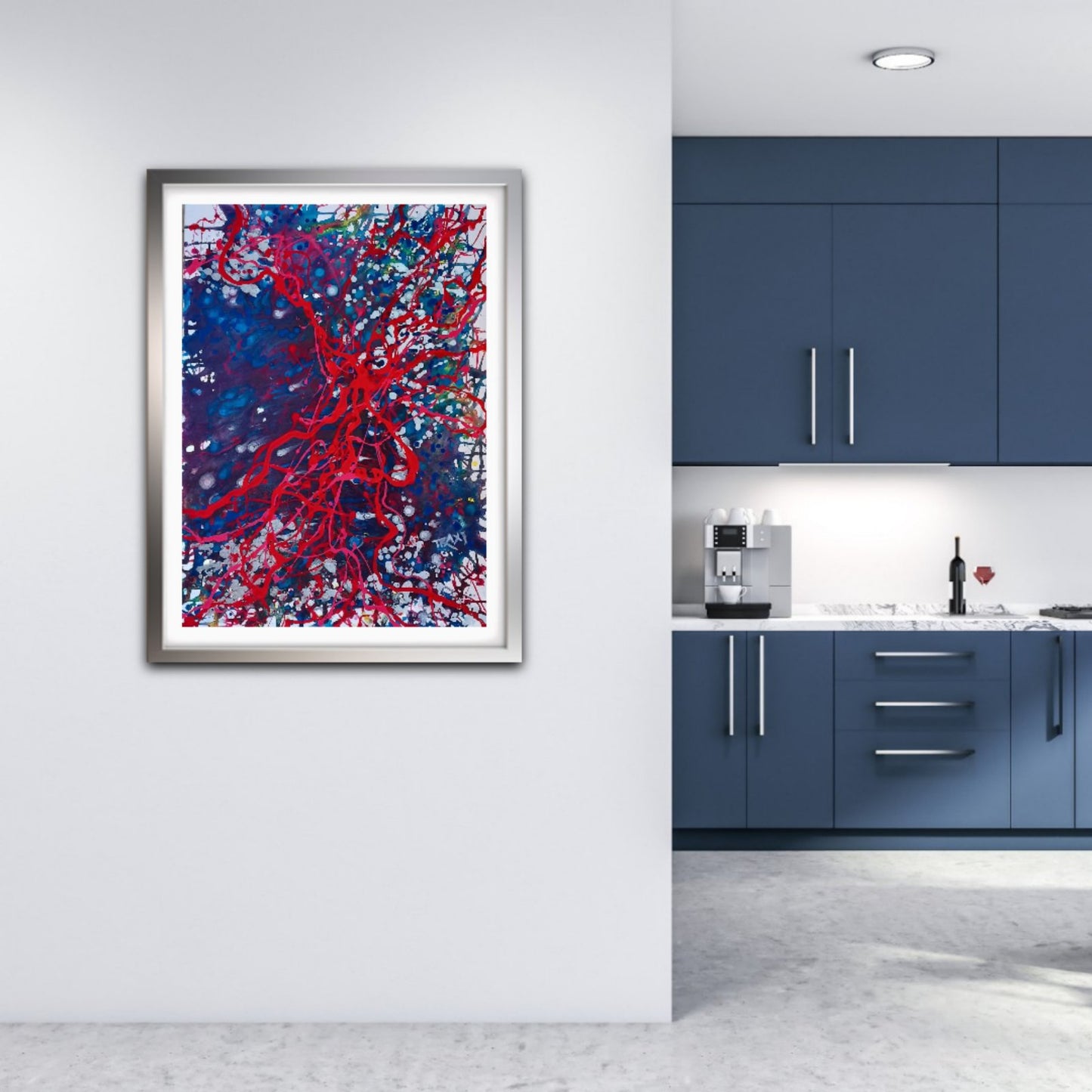 Blood Connection original red, blue, and silver abstract painting by Diana Dimova TRAXI ART. Winner of First Prize in San Francisco 2024. A framed abstract art print featuring vibrant red and blue paint splatters on a white background, displayed on a light gray wall in a modern kitchen setting.