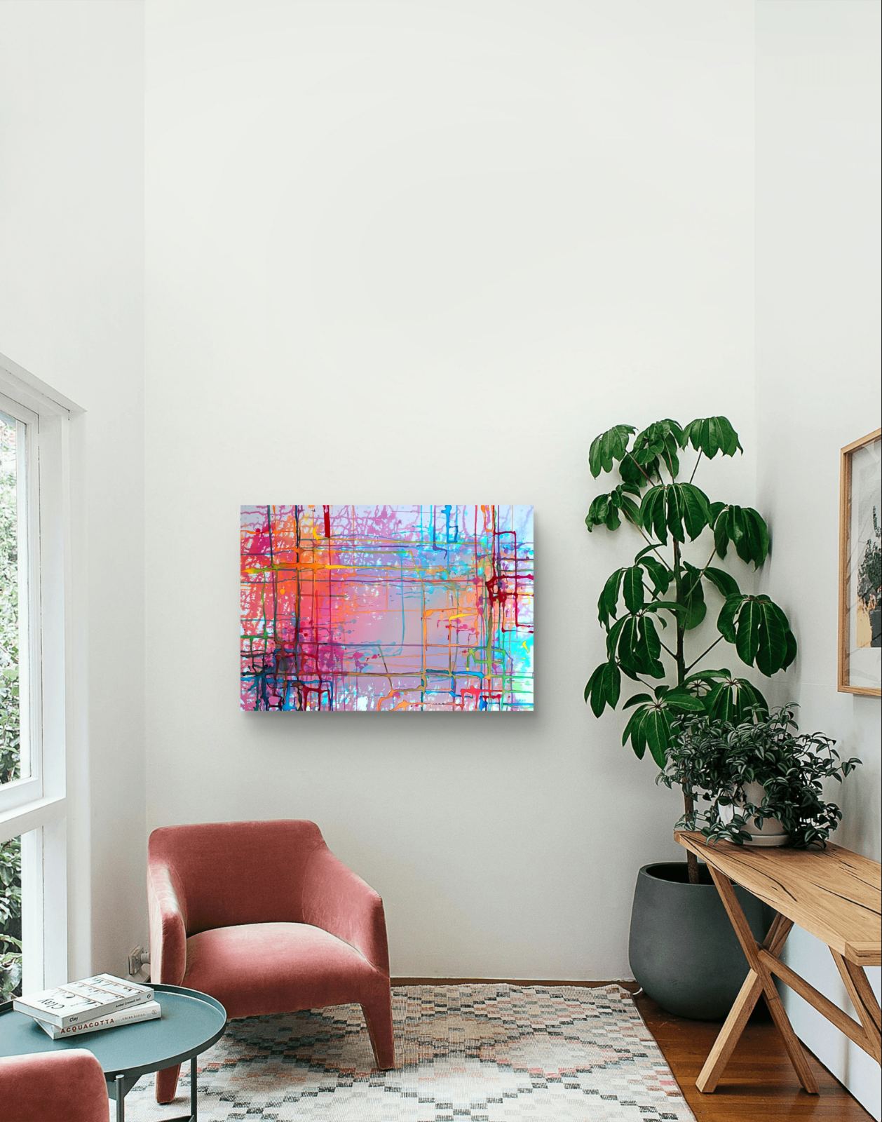 Colorful Windows original mixed media abstract painting on canvas by Diana Dimova TRAXI ART. Certificate Award Winner 2025. A colorful abstract canvas print with vibrant pink, blue, orange, and yellow brushstrokes, displayed on a white wall in a modern living room setting with a pink armchair, green plant, and wooden console table.