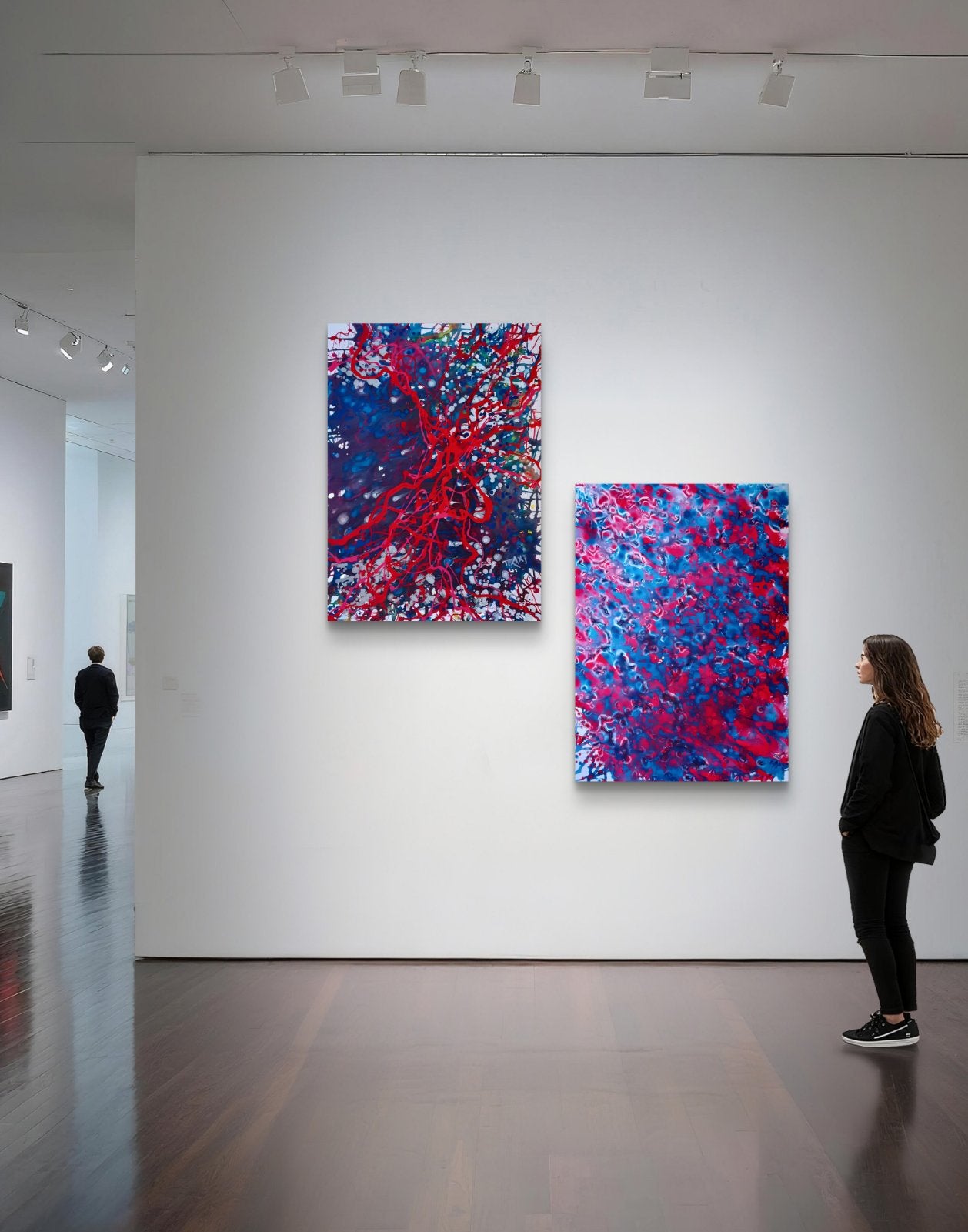 lemental Dialogue limited edition diptych print consisting of Blood Connection and Red & Blue Balance abstract paintings by Diana Dimova TRAXI ART. Two abstract paintings on a white wall in an art gallery with a person observing.