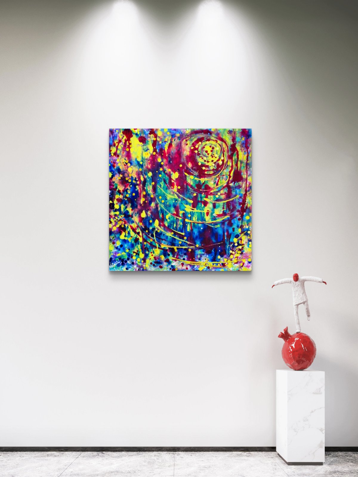 Lighthouse Bold Colorful Abstract limited edition premium canvas print by Diana Dimova TRAXI ART. . A square abstract canvas painting with a vibrant multicolor swirl pattern, displayed on a white gallery wall under spotlights, with a red sculpture on a white pedestal below.