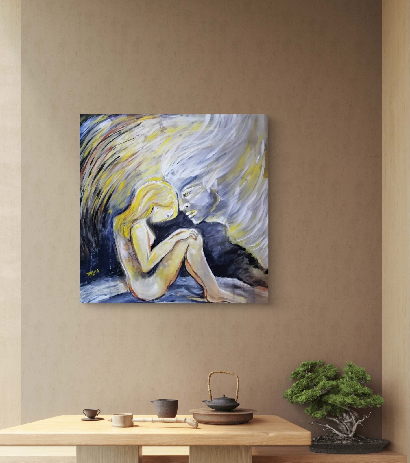 Promised by the Wind limited edition premium square canvas print with black, white, gold, and silver abstract layers by Diana Dimova TRAXI ART.  A square abstract painting of a seated figure with flowing yellow, white, and blue brushstrokes, displayed on a beige wall above a light wood table with tea items and a bonsai tree.