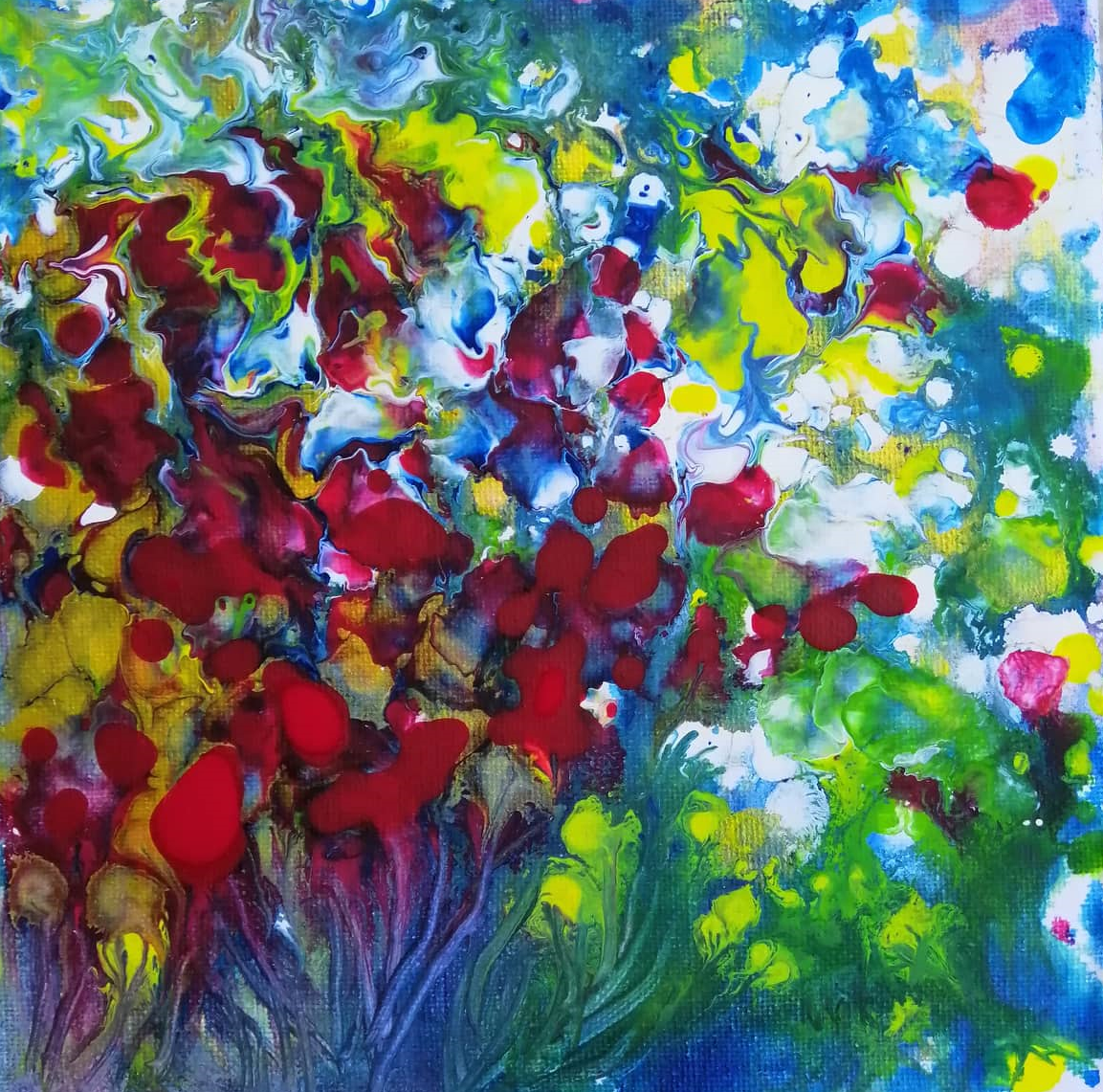 Abstract floral painting with bold red blossoms, green leaves, blue and yellow highlights, and white areas on a textured canvas background. Red Flowers original small abstract floral landscape fluid acrylic painting with vibrant red, green, and white tones by Diana Dimova TRAXI ART.