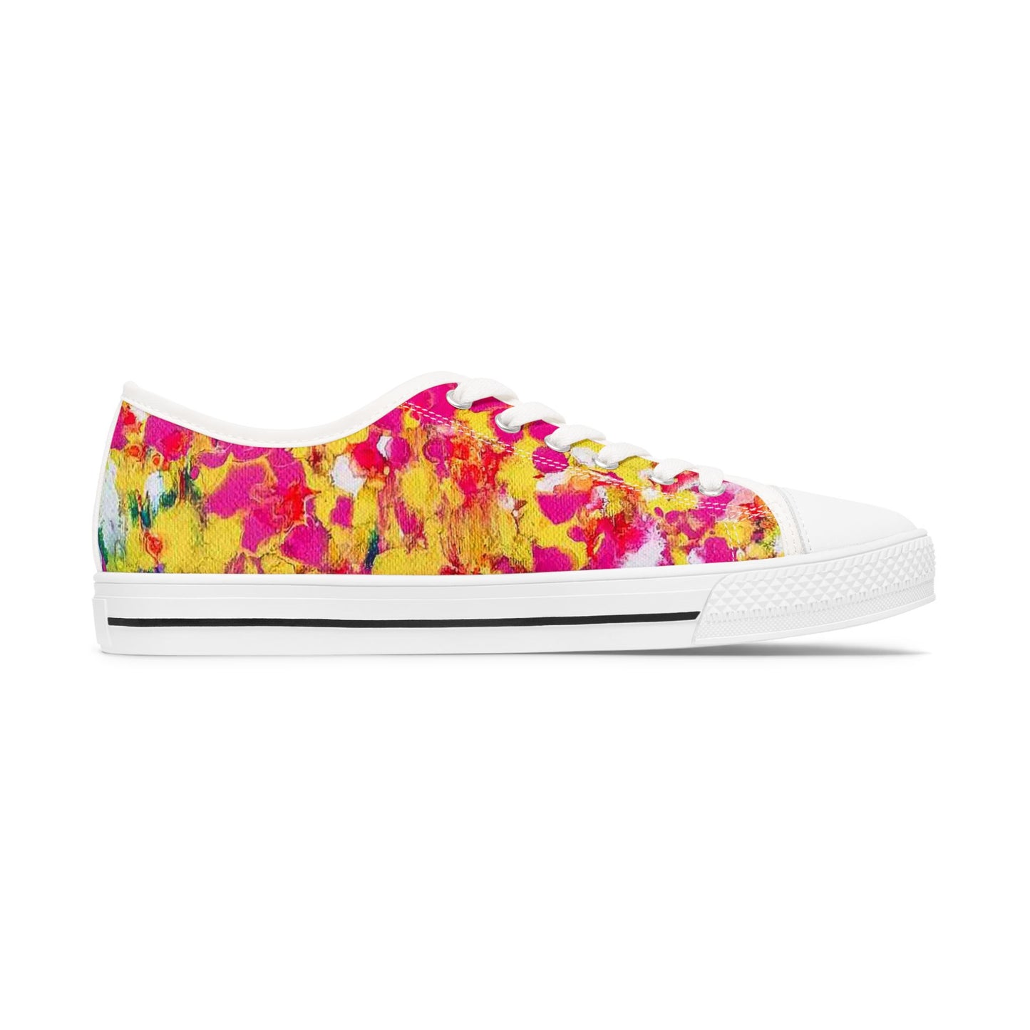 Women's low top sneakers of happiness featuring abstract wearable art inspired by the painting Summer Flowers by Diana Dimova TRAXI. A low-top canvas sneaker with a vibrant abstract floral pattern in pink, yellow, and green, featuring a white rubber toe cap, white laces, and a white midsole with a thin black stripe.