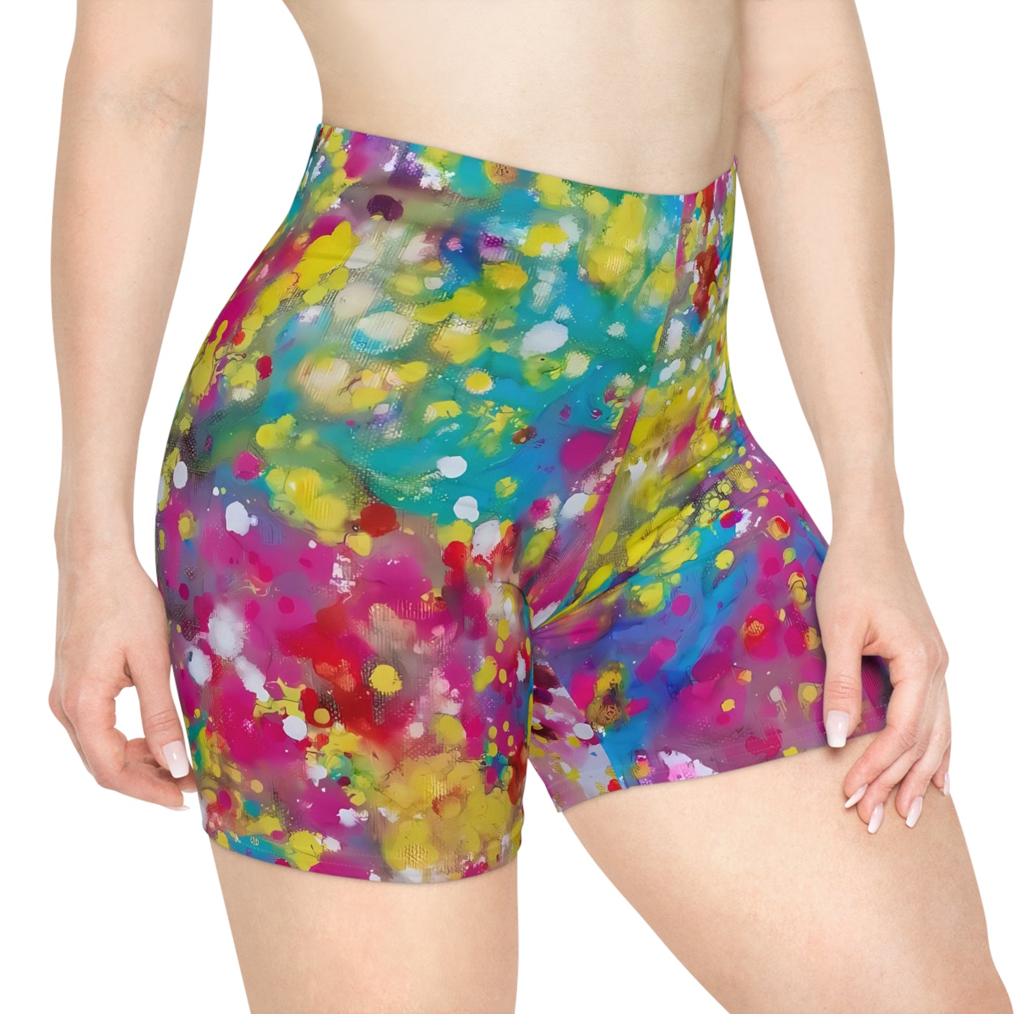 Women's summer biker shorts of happiness featuring abstract wearable art inspired by the Paintings of Happiness series by Diana Dimova TRAXI. A close-up of a model wearing high-waisted athletic shorts with a vibrant multicolor abstract paint splatter pattern on a white background.