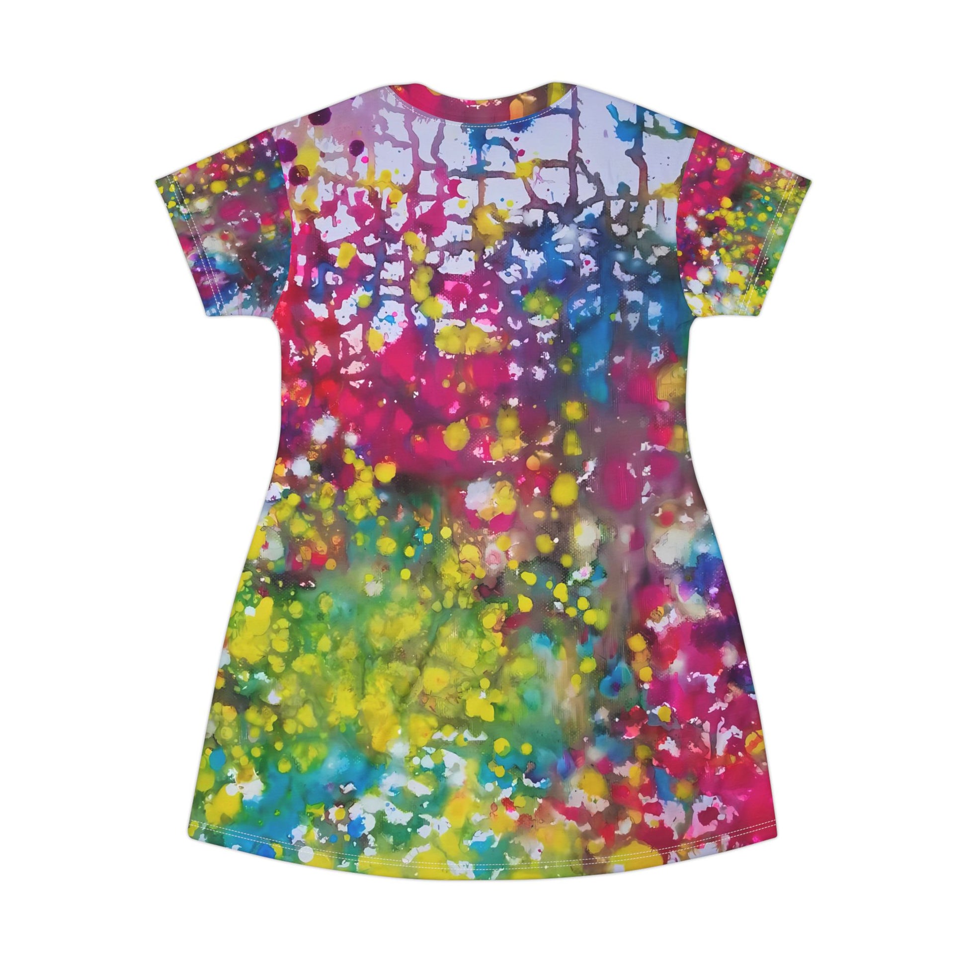 Women's summer t-shirt dress of happiness featuring abstract wearable art by Diana Dimova TRAXI. A short-sleeve t-shirt dress with an all-over abstract paint splatter pattern in a vibrant mix of pink, yellow, green, blue, purple, and white, shown against a plain white background.